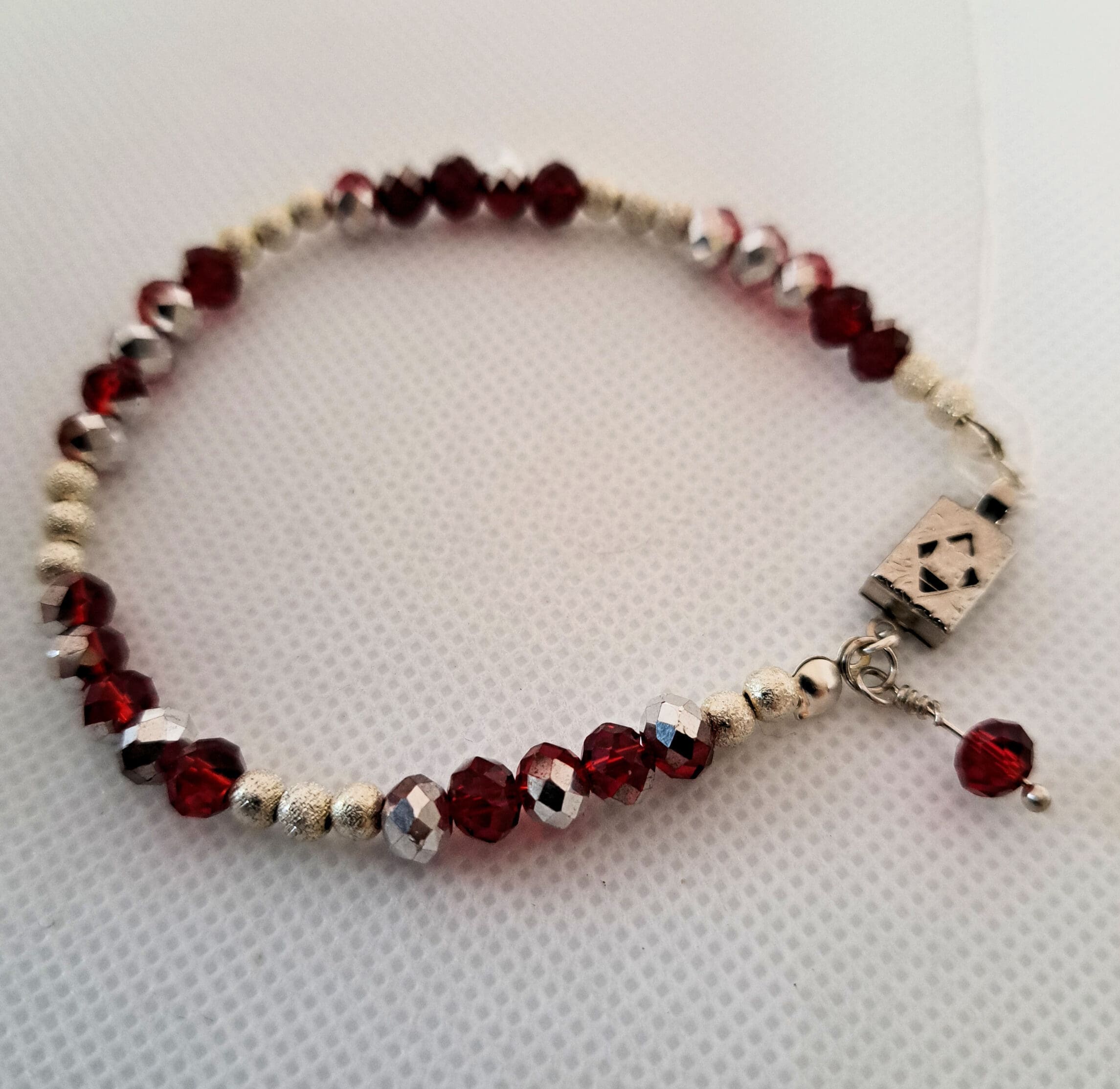 Luxurious faceted red and silver crystal bracelet Faceted red and silver crystal bracelet