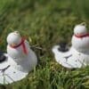 Adorable Melty Snowman Ornament with Red Scarf - Image 3