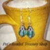 Aqua Blue Beaded Drop Earrings with Silver Floral Caps - Image 3