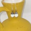 Elegant White Bead Earrings with Silver Bead Caps - Image 3