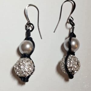 Knotted faux pearl and pave earrings