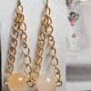 Peach Glow Dangle Earrings - Image 4