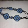 Blue Petal Beaded Bracelet with Iridescent Flower Accents - Image 3