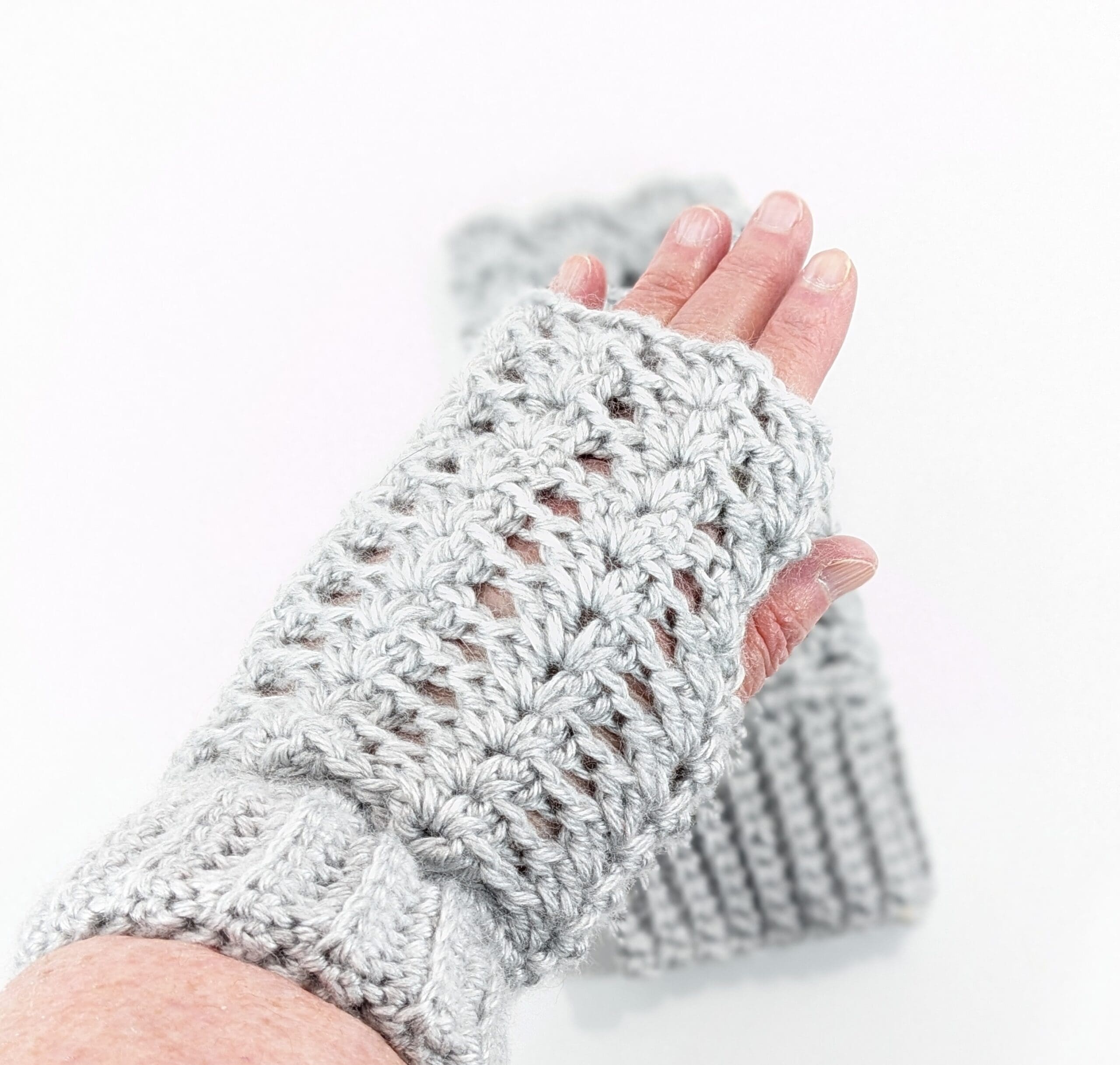 Crochet fingerless glove accessories selections Crochet fingerless light grey glove accessories.