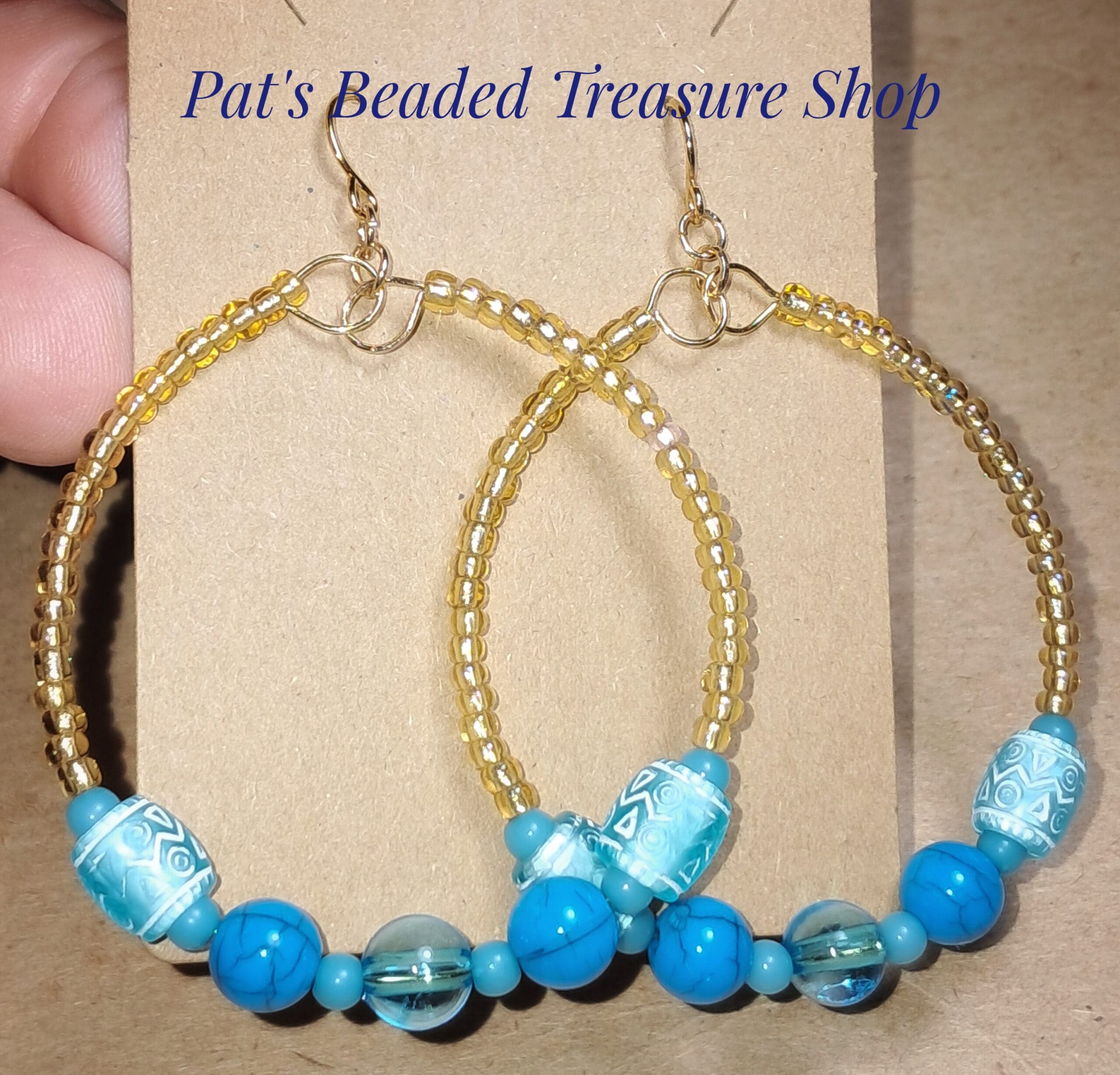 Unique blue acrylic beaded memory wire earrings with gold plated ear wires Unique blue acrylic beaded memory wire earrings with gold plated ear wires