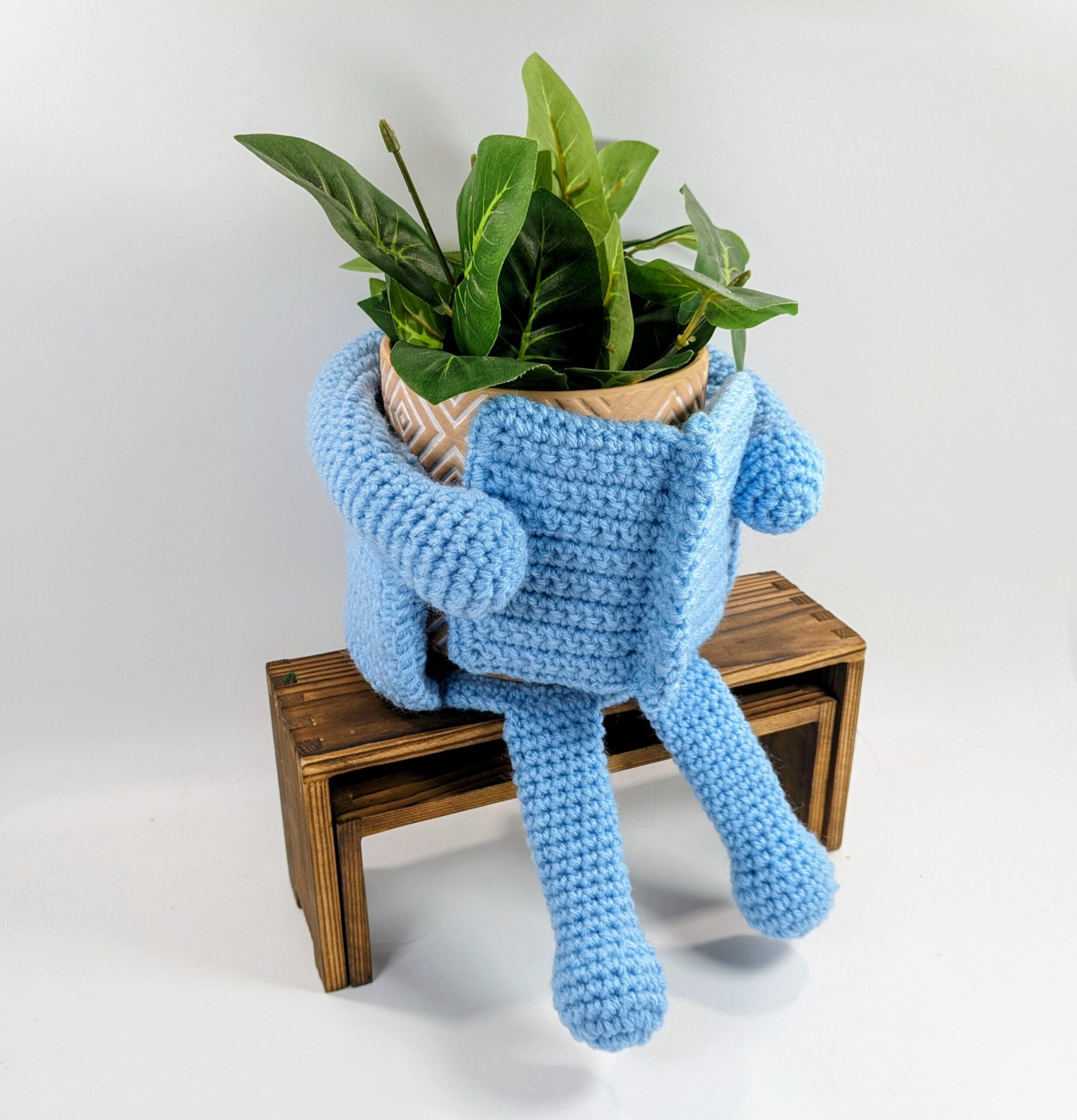 Powder blue reading tp & plant crochet cozy Powder blue reading tp & plant crochet cozy
