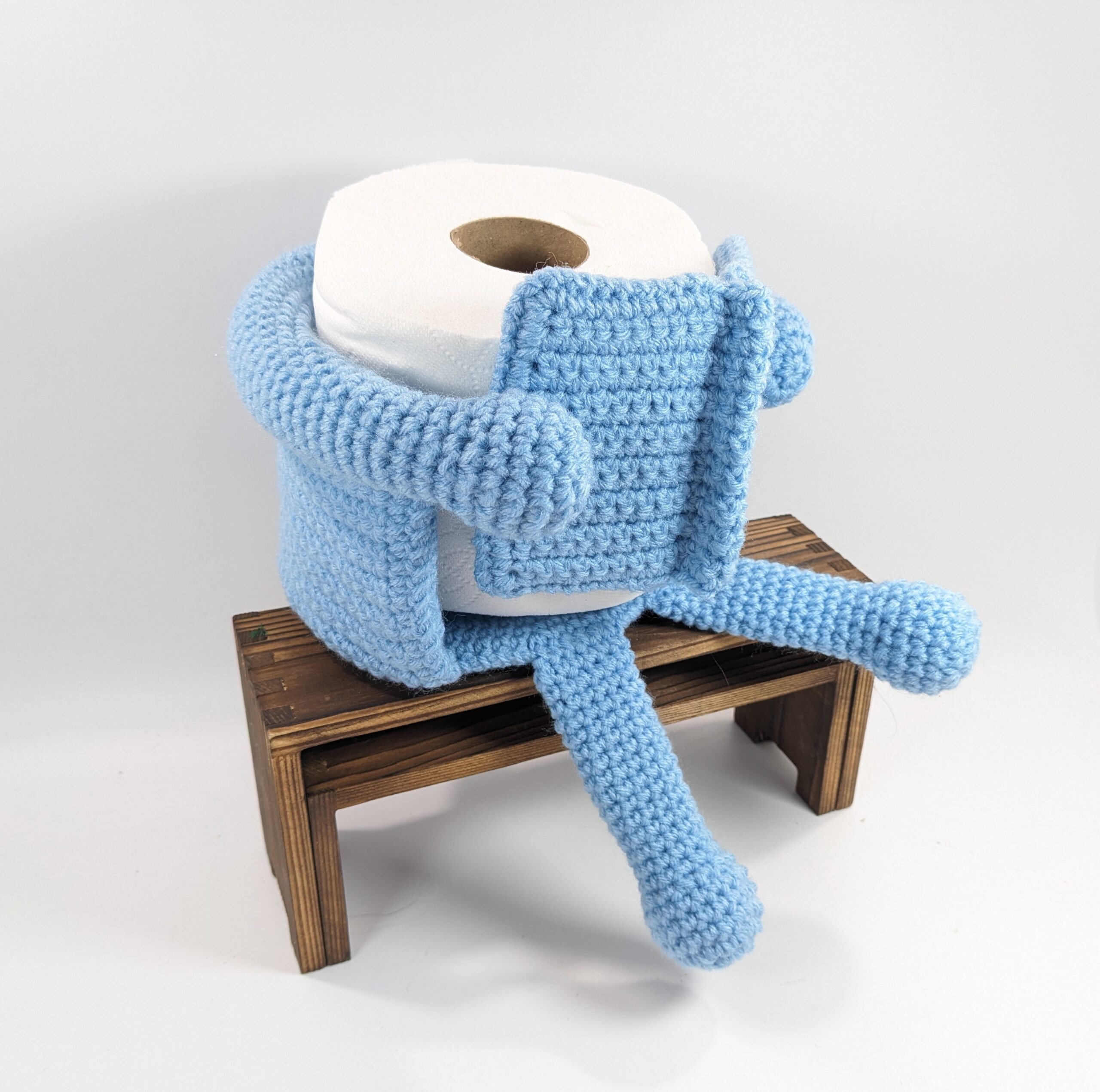 Powder blue reading tp & plant crochet cozy Powder blue reading tp & plant crochet cozy