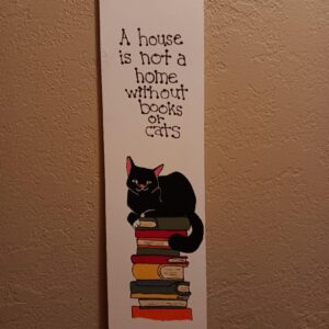 A House is Not a Home Without Books or Cats