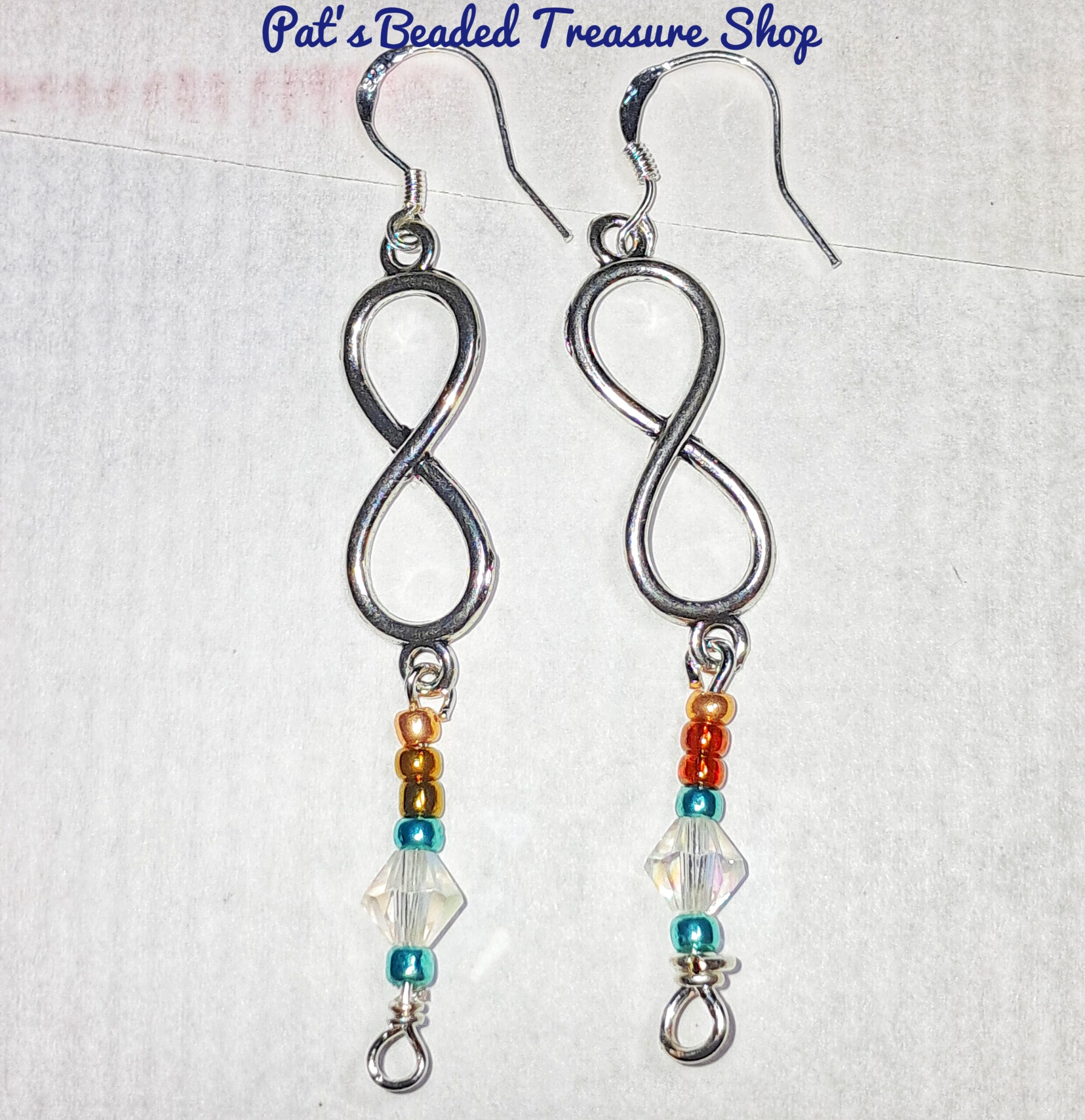 Unique infinity earrings with sterling silver ear wires Unique infinity earrings with sterling silver ear wires