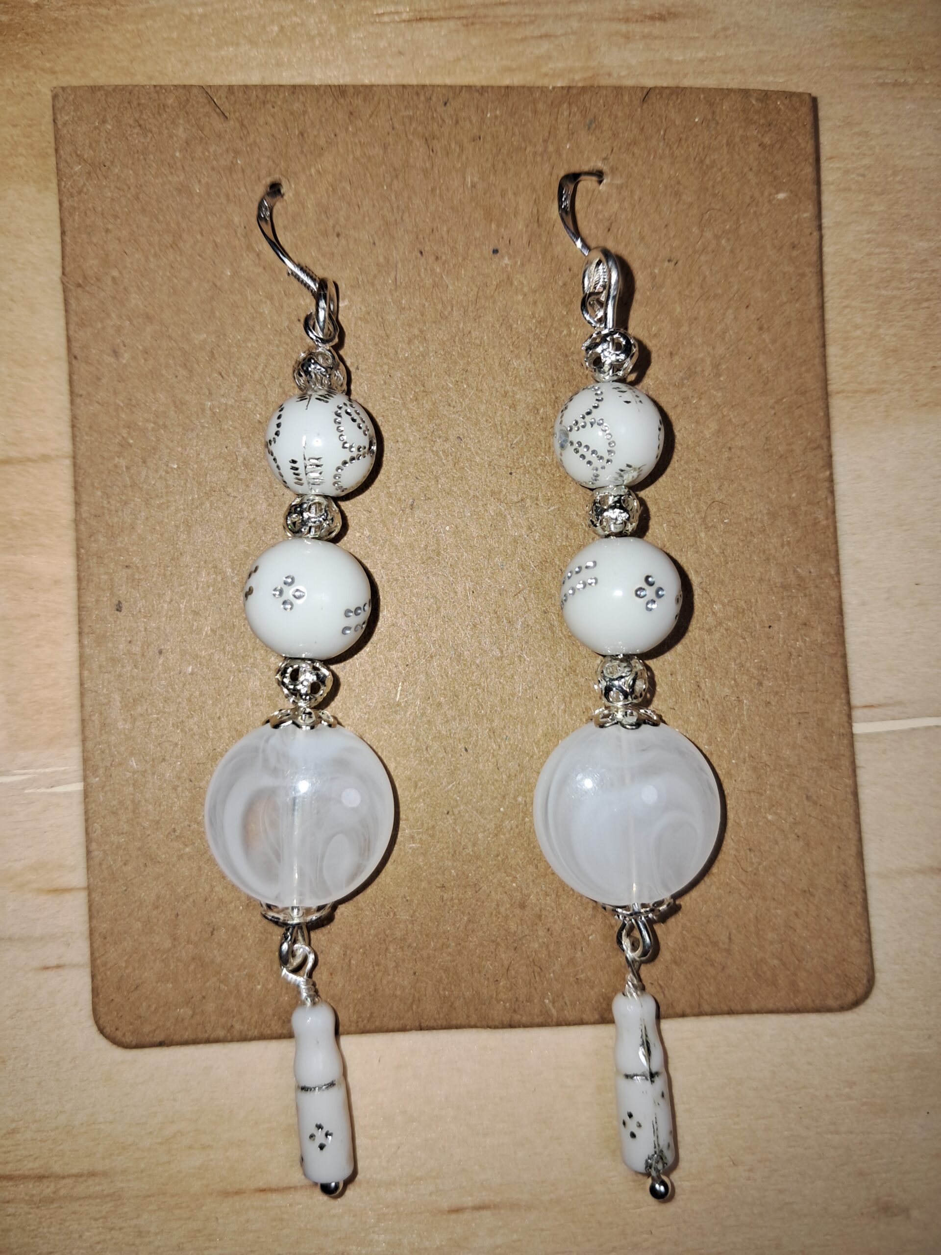 White handmade statement beaded dangle earrings White handmade statement beaded dangle earrings