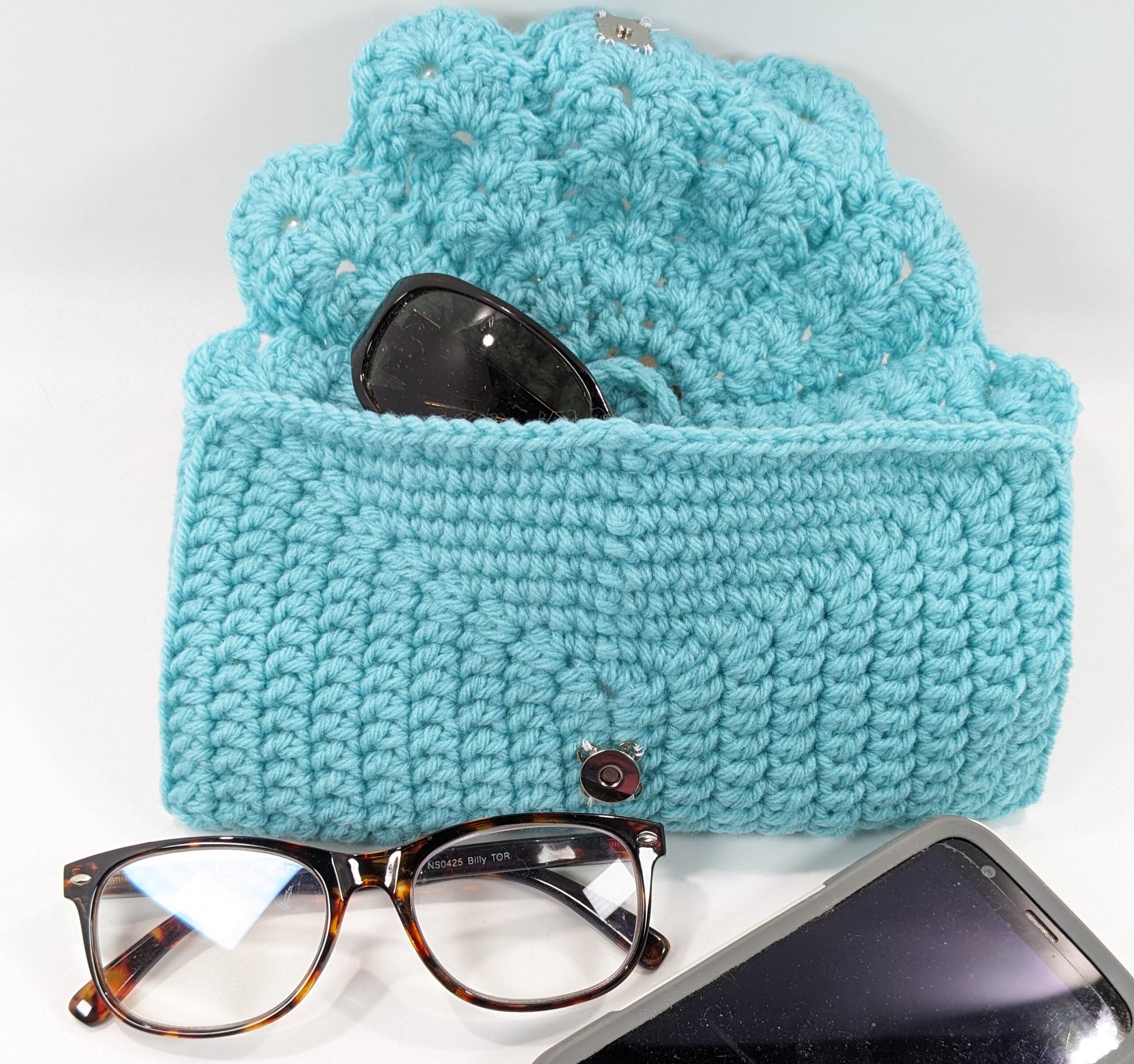 Shell phone & glasses teal crochet case Shell phone & glasses teal crochet case