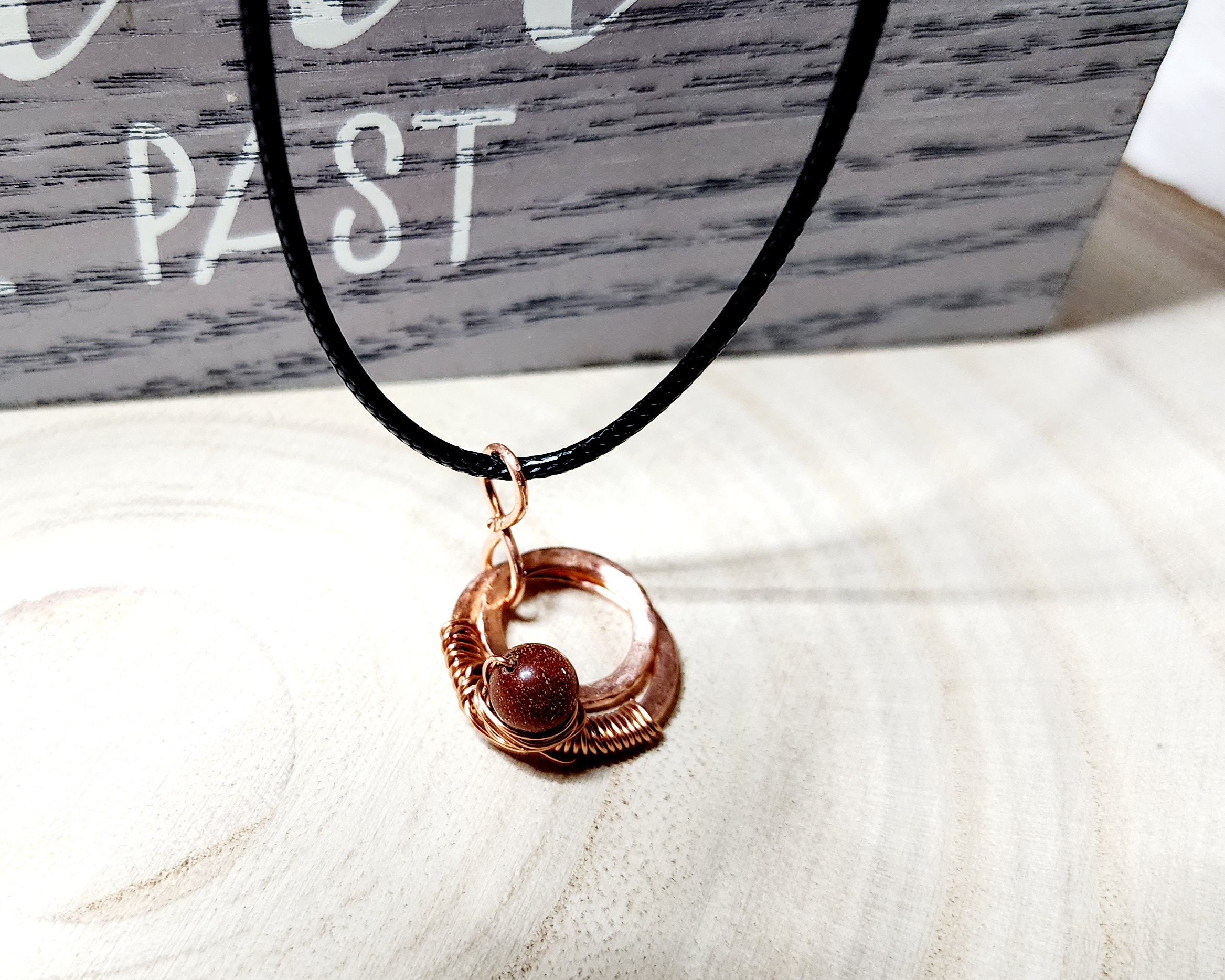 Handcrafted hammered copper washer necklace with silver star or copper bead on black cord Handcrafted hammered copper washer necklace with silver star or copper bead on black cord - image 5