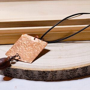 Hammered Copper Pendant Necklace with Dark Stone Accent