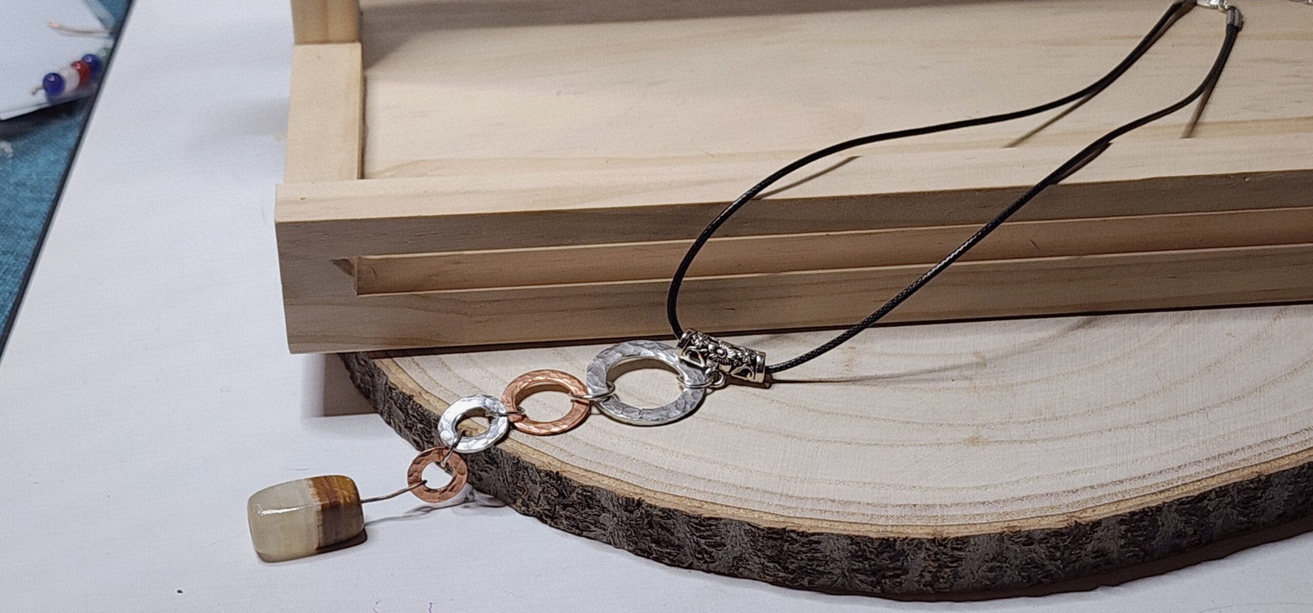 Hammered copper & silver link necklace with polished stone accent Hammered copper & silver link necklace with polished stone accent