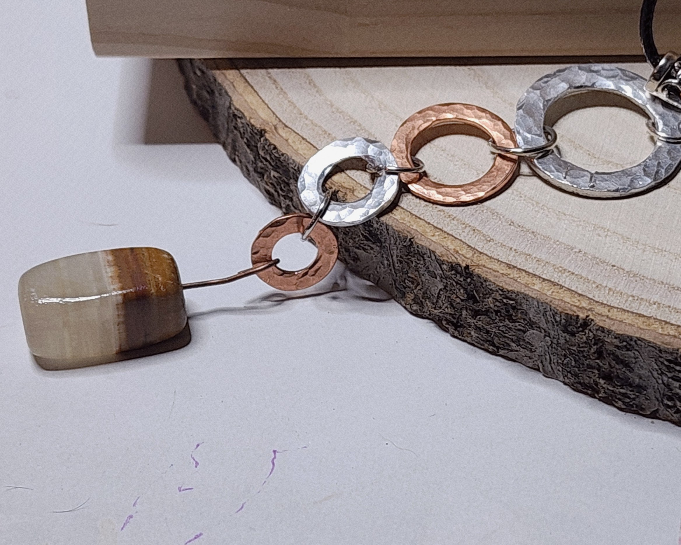 Hammered copper & silver link necklace with polished stone accent Hammered copper & silver link necklace with polished stone accent