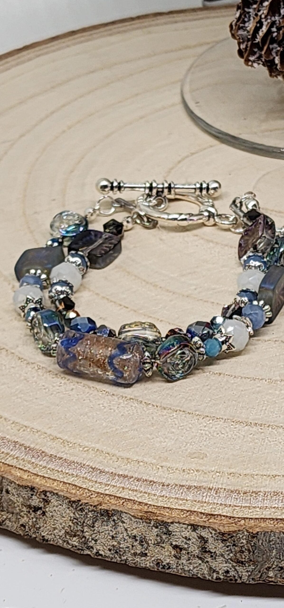 Handcrafted double strand beaded bracelet – artisan toggle clasp | unique gift | blue, purple, metallic tones Handcrafted double strand beaded bracelet – artisan toggle clasp | unique gift | blue, purple, metallic tones