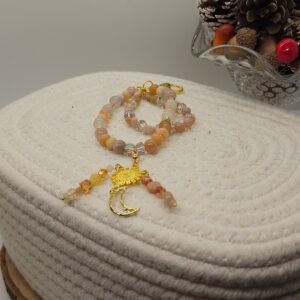 Celestial Glow Bag Charm – Handmade Beaded Accessory with Sun & Moon Charms