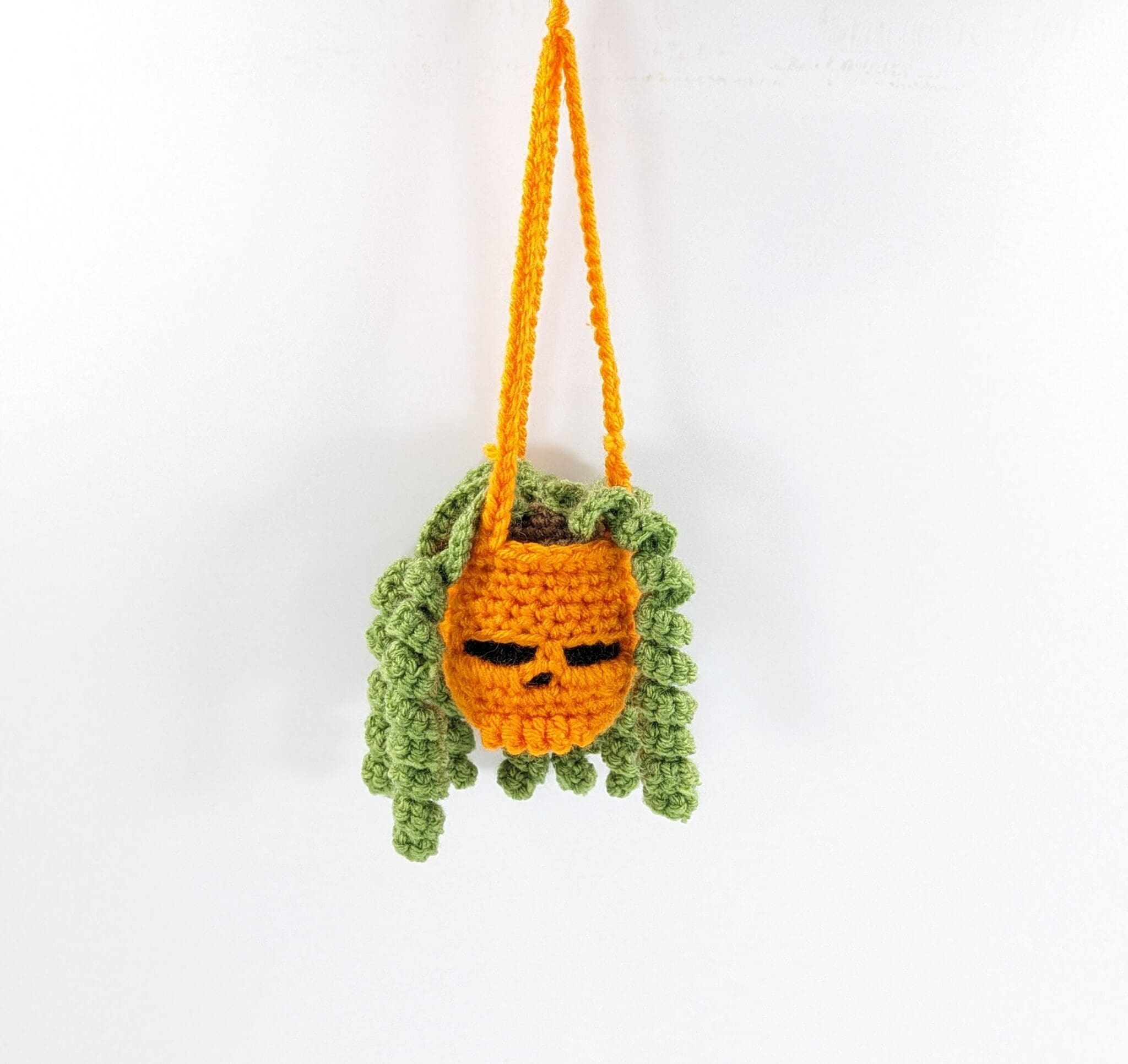 Orange skull hanging crochet plant car decor Orange skull hanging crochet plant car decor
