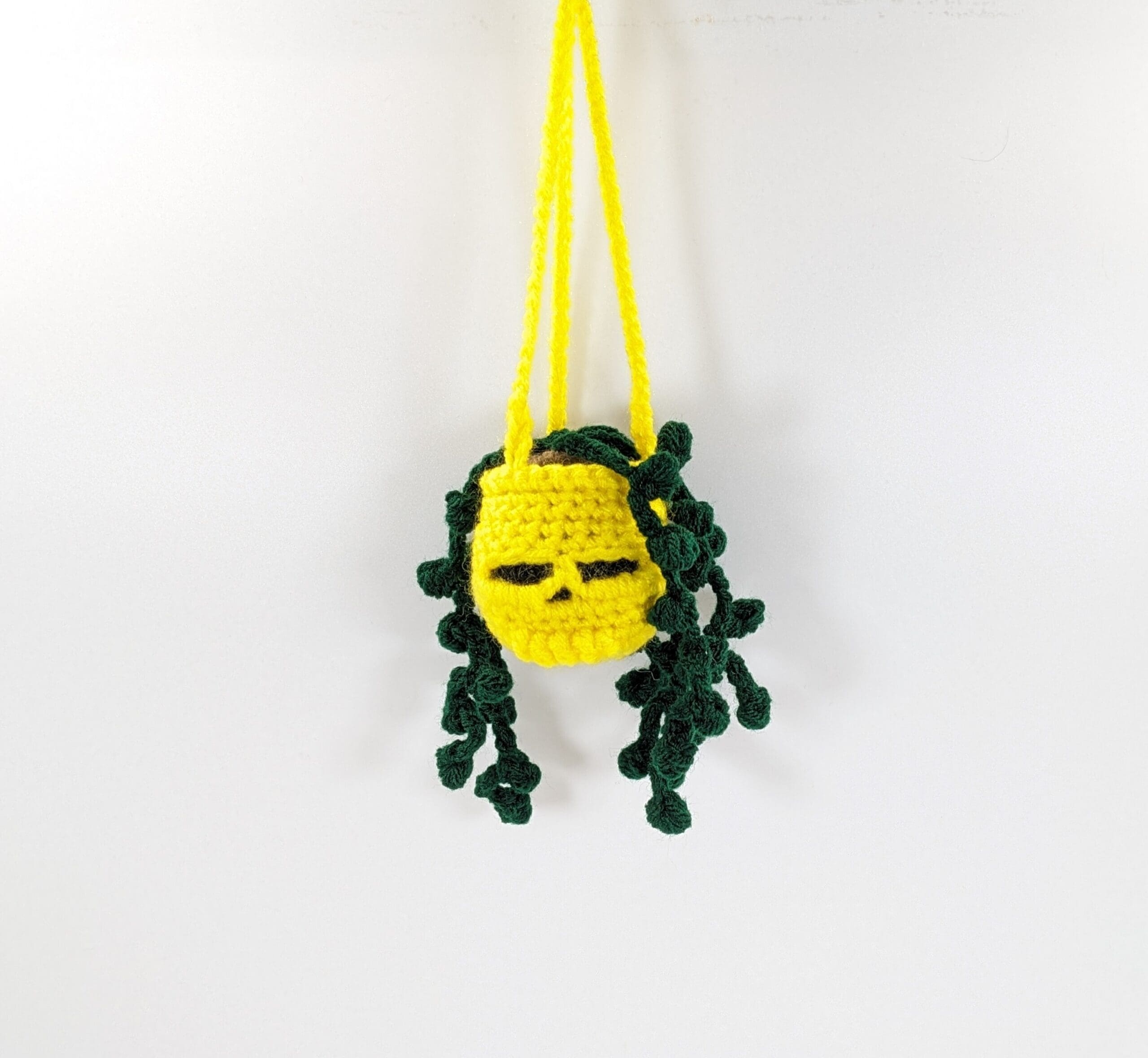 Yellow skull hanging crochet plant car decor Yellow skull hanging crochet plant car decor